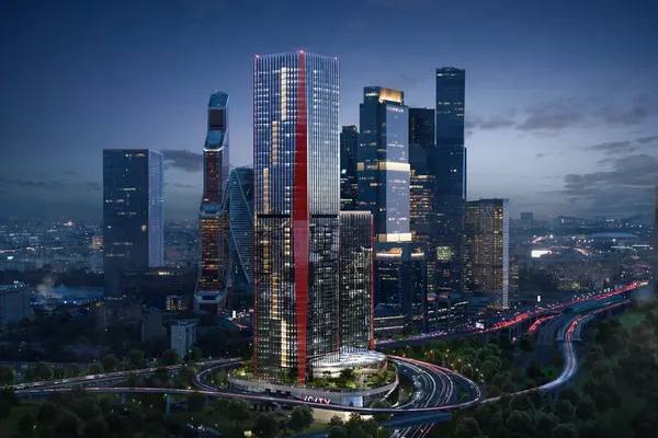 Панорамный вид на офисный комплекс iCITY в Москва-Сити с архитектурной подсветкой и транспортной развязкой на переднем плане
