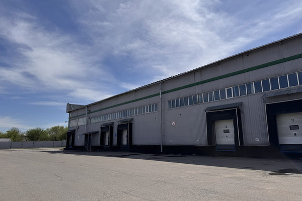 складской комплекс Damu Logistics в Алматы погрузочные ворота логистика Казахстан склад стройматериалов